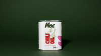 Tin of Moc Chili Oil, 150ml, against a dark green background